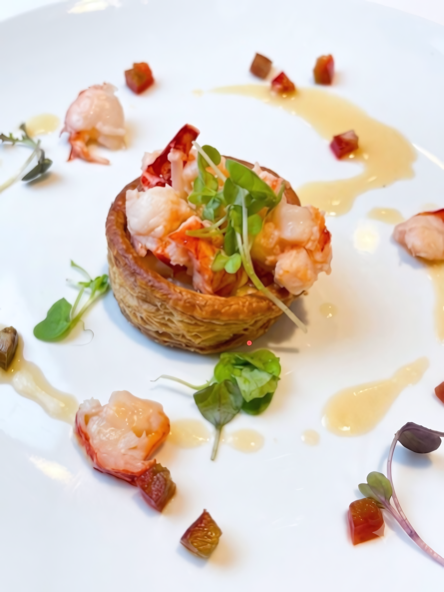 Lobster vol-au-vent with microgreens and butter sauce